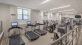 Fitness Center featuring cardio equipment, free weights and standing bikes