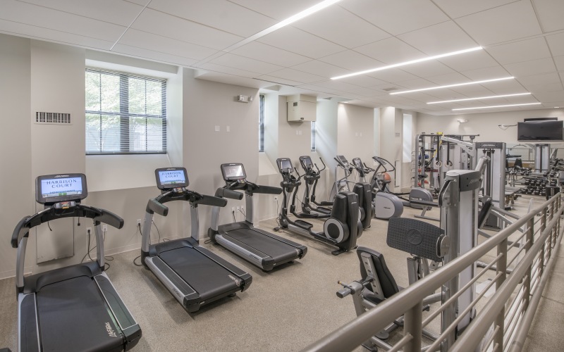Fitness Center featuring cardio machines, spin bikes, free weights and strength training equipment